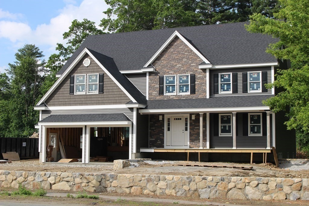 687 Boston Road Billerica, MA 01821 - Photo 3 of 20 a front view of a house with a yard
