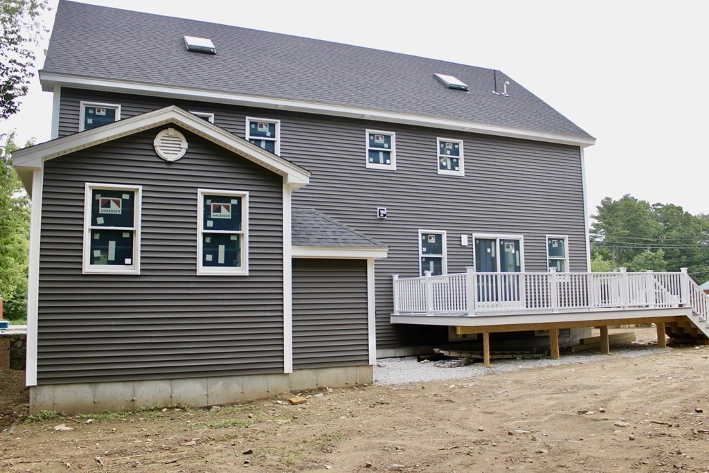 687 Boston Road Billerica, MA 01821 - Photo 5 of 20 a front view of a house with a yard