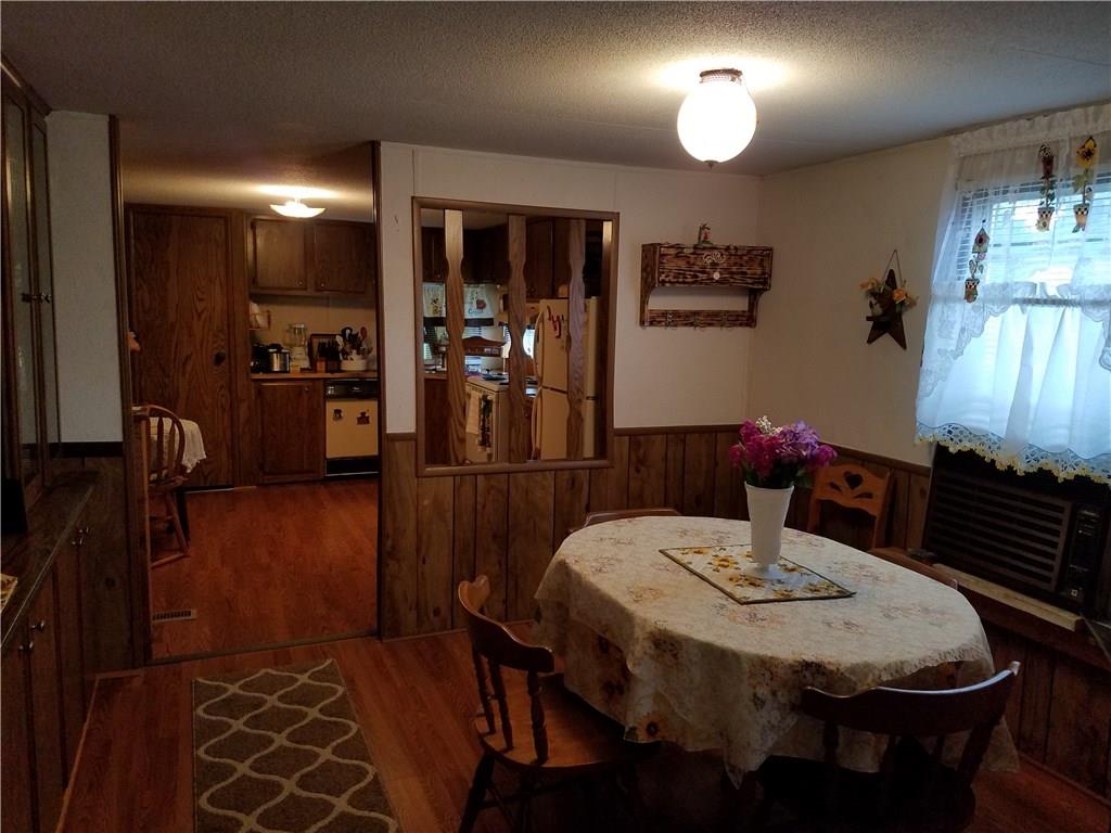 852 Robb Road New Florence, PA 15944 - Photo 11 of 24 Dining Room with peak view of kitchen. New flooring in dining and kitchen area.