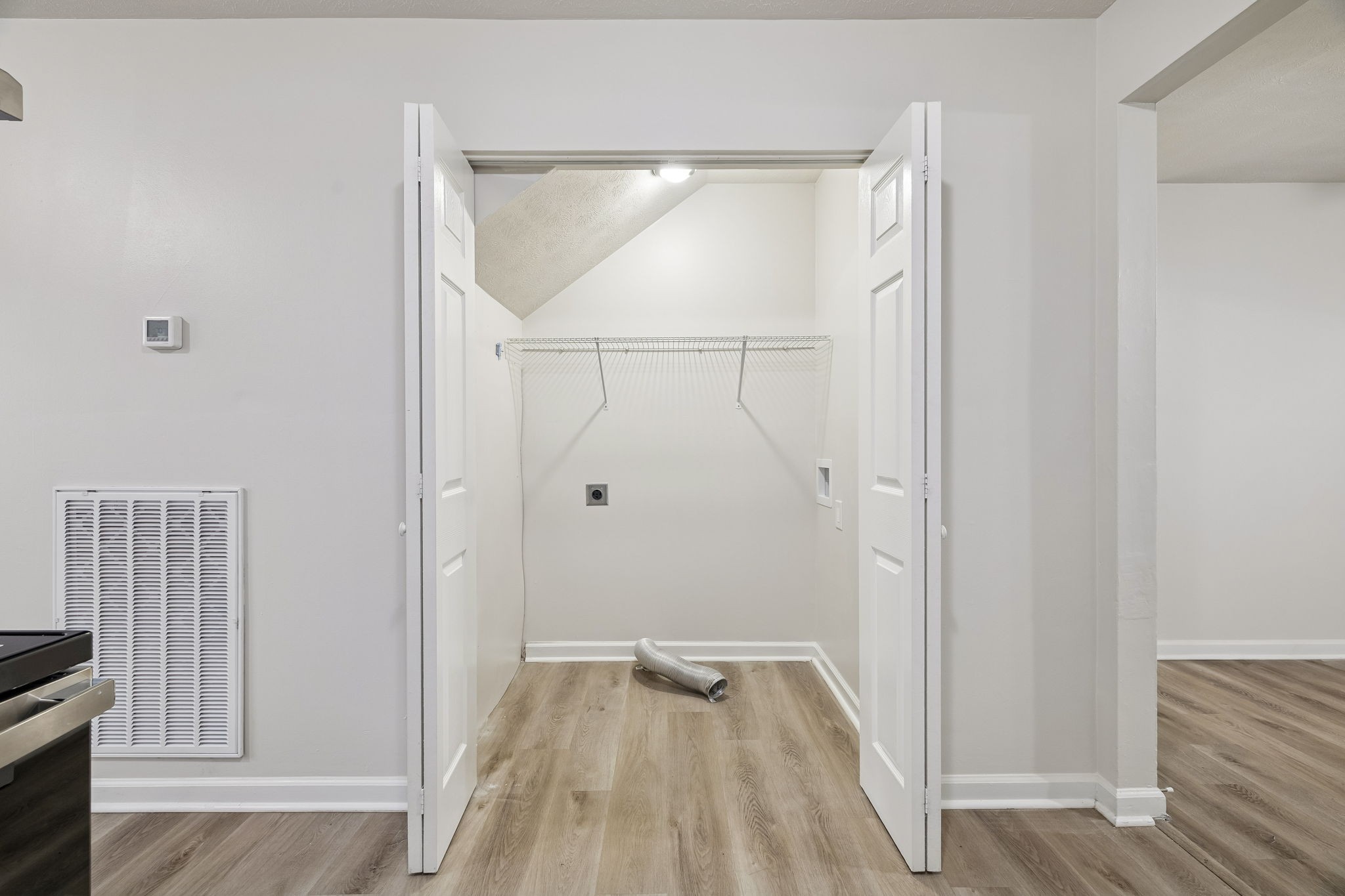 2607 Landrum Court, Unit 15 Springfield, TN 37172 - Photo 19 of 38 a view of walk in closet with wooden floor