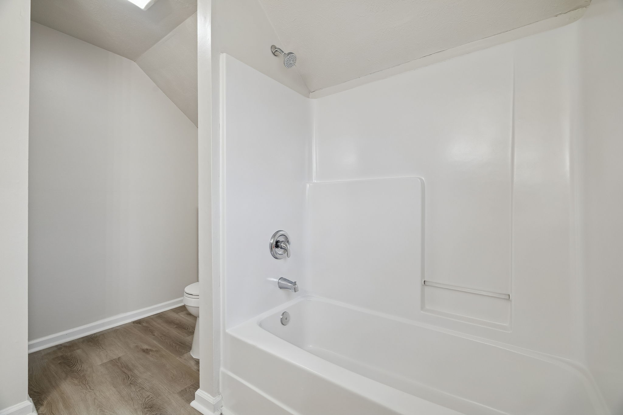 2607 Landrum Court, Unit 15 Springfield, TN 37172 - Photo 21 of 38 a white bath tub sitting next to a shower