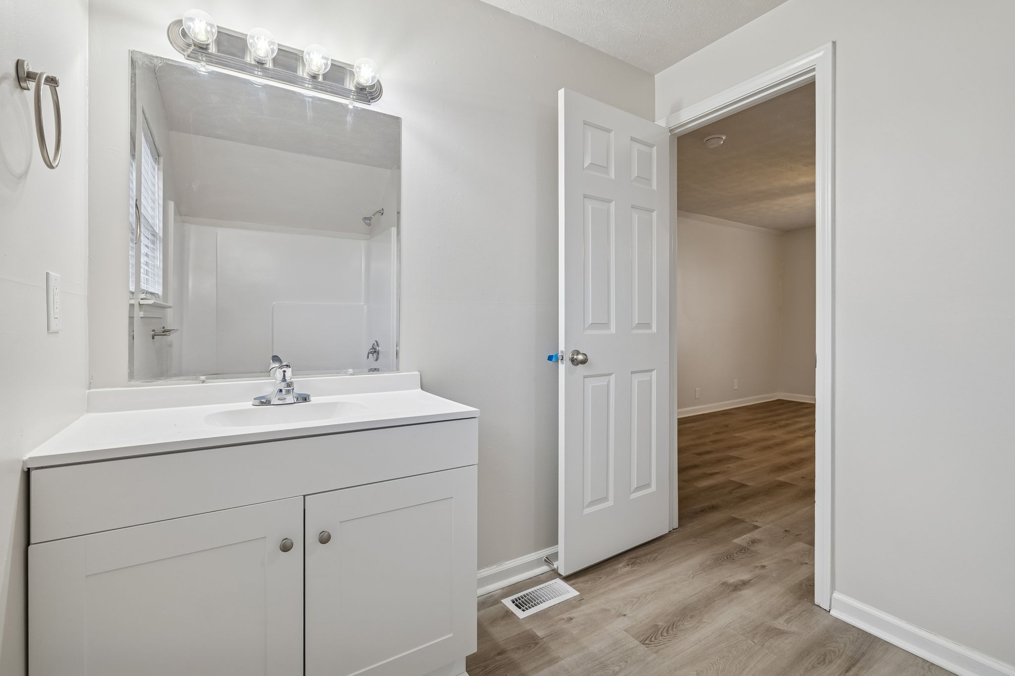 2607 Landrum Court, Unit 15 Springfield, TN 37172 - Photo 22 of 38 a bathroom with a sink and mirror