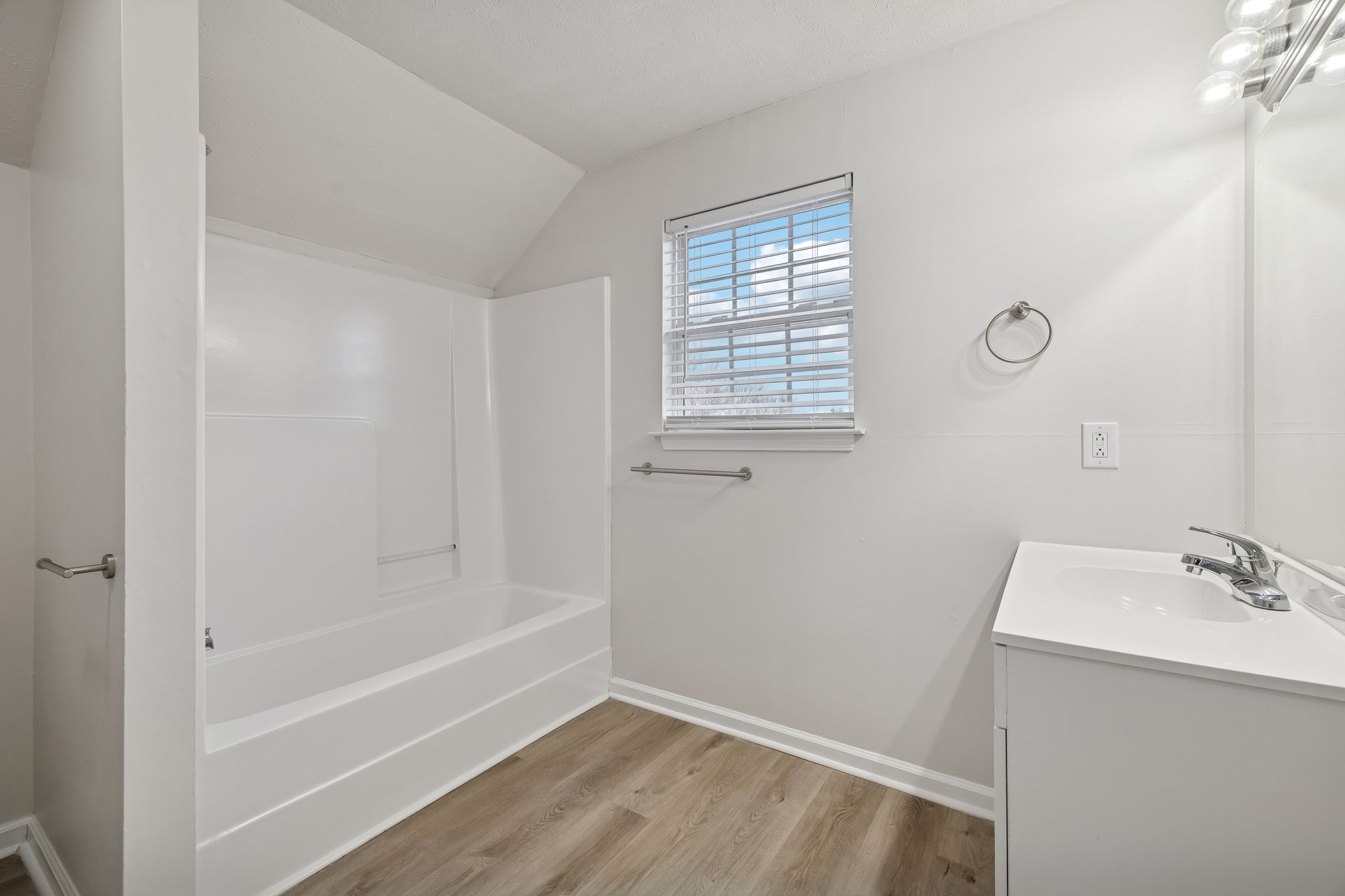 2607 Landrum Court, Unit 15 Springfield, TN 37172 - Photo 23 of 38 a bathroom with a bathtub sink vanity and a shower