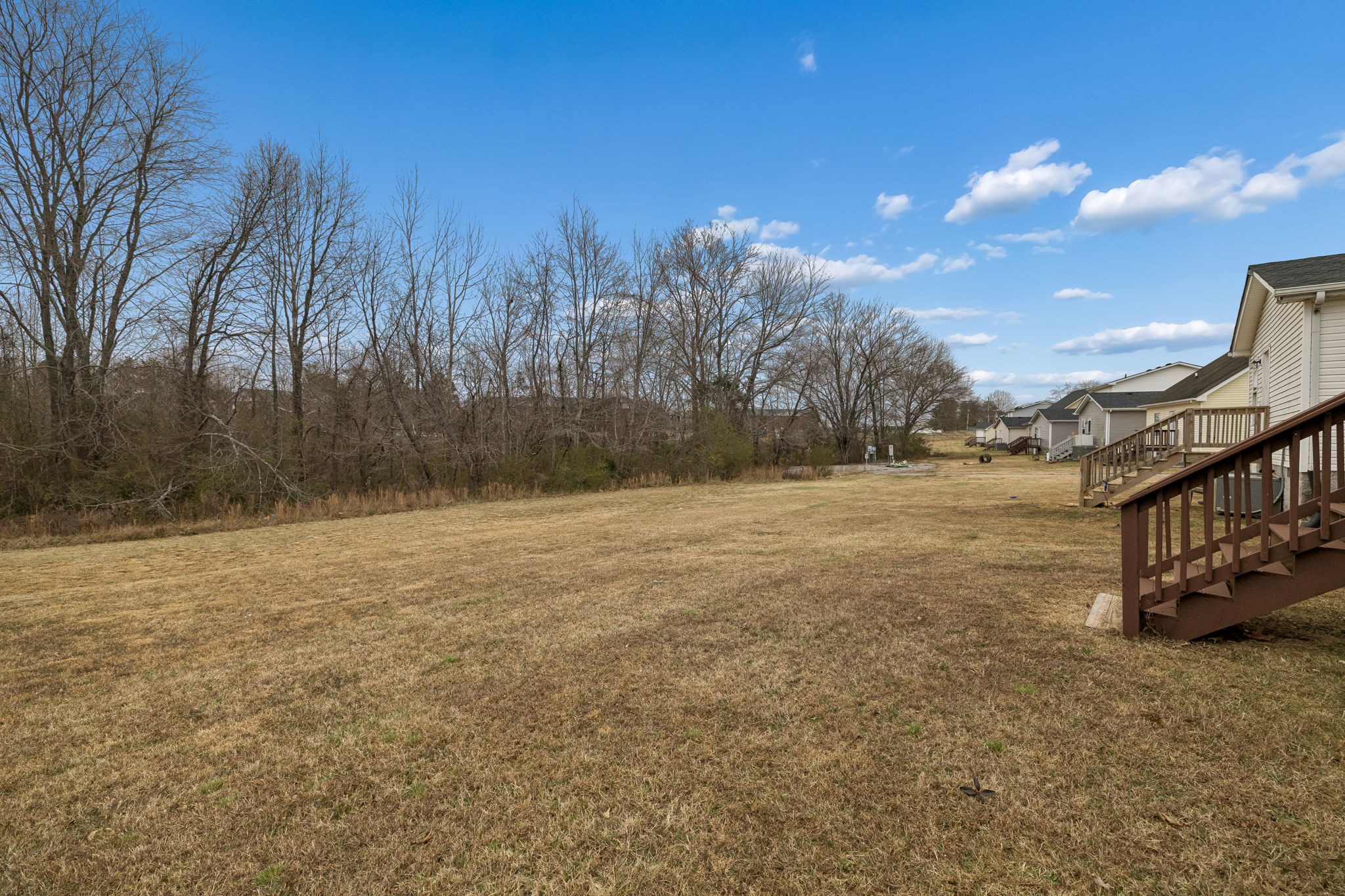 2607 Landrum Court, Unit 15 Springfield, TN 37172 - Photo 36 of 38 a view of outdoor space with deck and yard