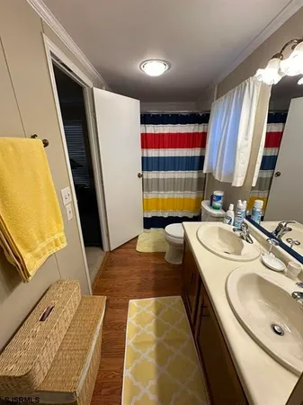 a bathroom with a tub and shower