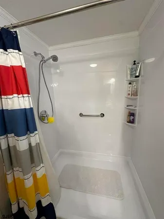a bed room with a bed and a tv