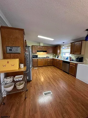a bedroom with a bed and a table in it