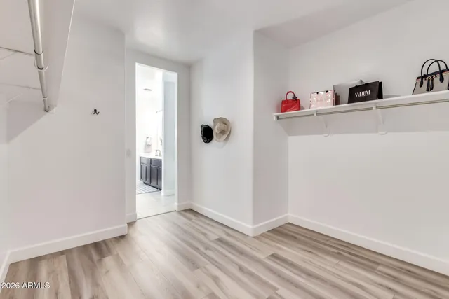 a view of a room with racks on the wall