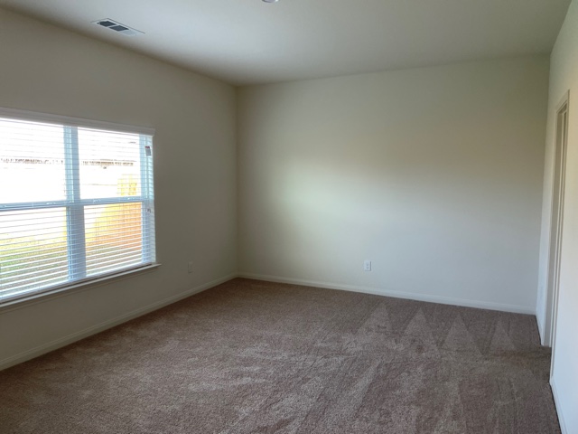 18741 Speculator Lane Elgin, TX 78621 - Photo 12 of 28 an empty room with a window