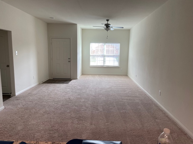18741 Speculator Lane Elgin, TX 78621 - Photo 13 of 28 a view of an empty room with a window
