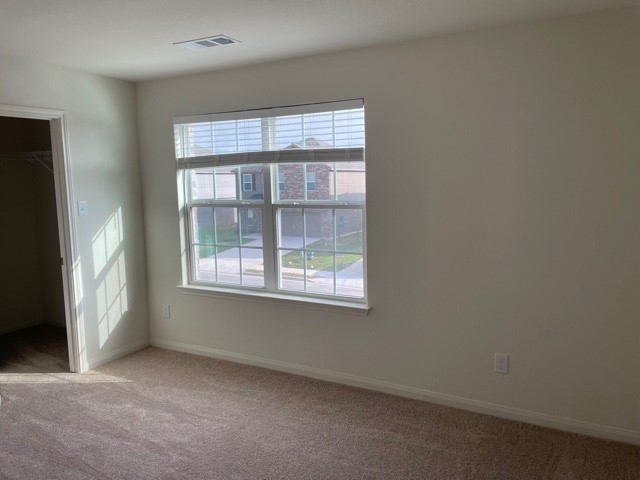 18741 Speculator Lane Elgin, TX 78621 - Photo 22 of 28 an empty room with a window