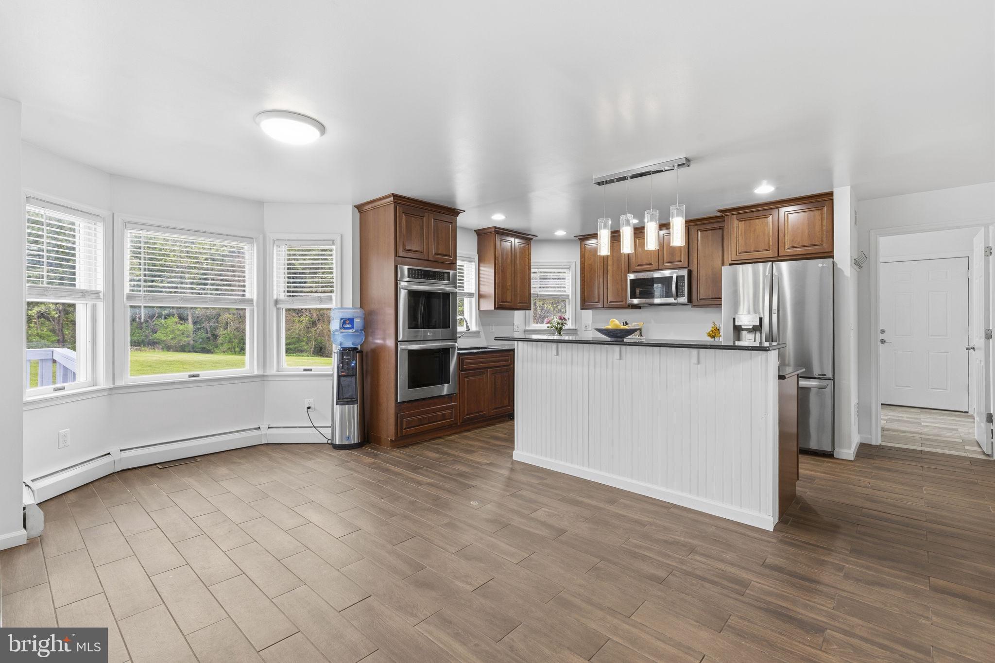 65 Watters Road New Park, PA 17352 - Photo 13 of 52 Bright and airy modern kitchen space.