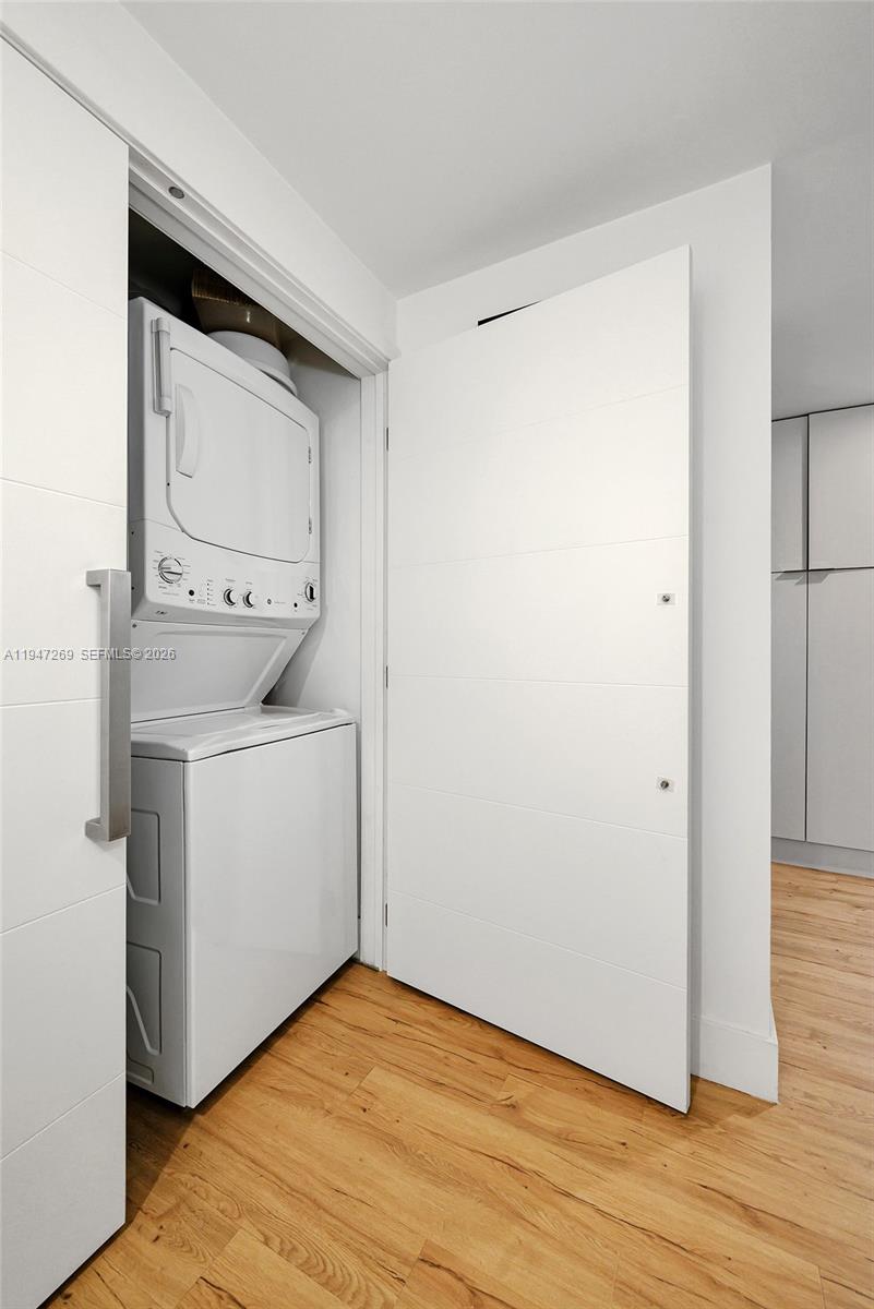 275 Northeast 18th Street, Unit 1207 Miami, FL 33132 - Photo 26 of 31 a utility room with dryer and washer