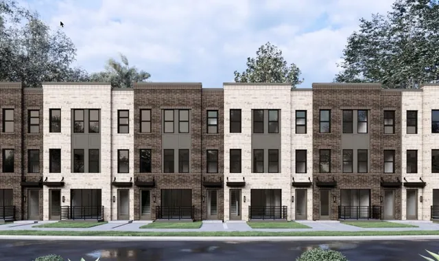 a view of a building with a yard