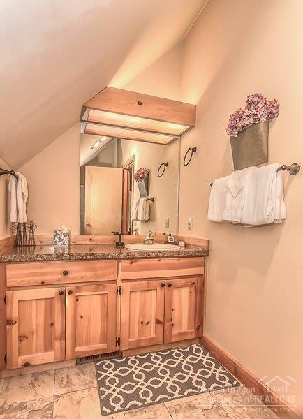 57529 Circle 4 Cabin Road Sunriver, OR 97707 - Photo 18 of 22 The Master Bath has knotty Alder cabinet