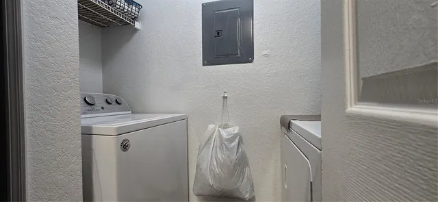 a bedroom with double bed and a window