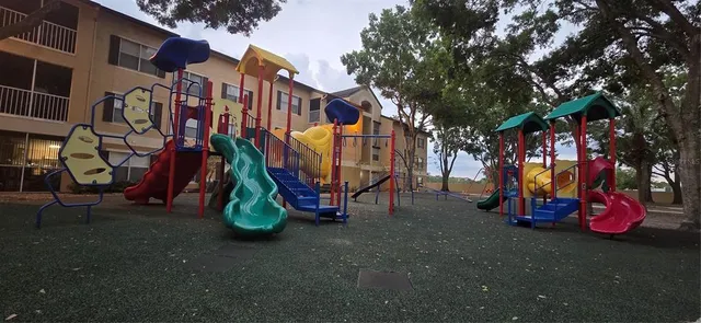 a backyard of a house with outdoor seating
