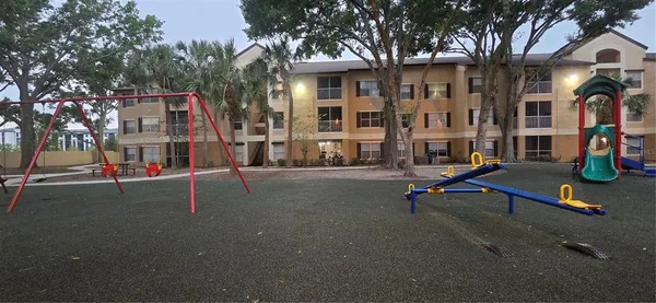 a view of a balcony with chairs and tables