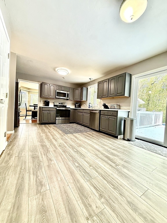 7 Tower Hill Road Oxford, MA 01540 - Photo 15 of 39 a large white bed in a white room