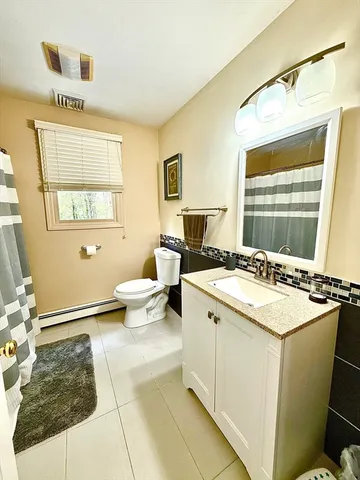 a view of living room with granite countertop furniture and a window