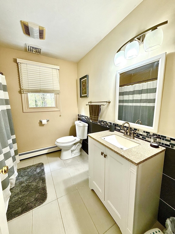 7 Tower Hill Road Oxford, MA 01540 - Photo 25 of 39 a view of living room with granite countertop furniture and a window