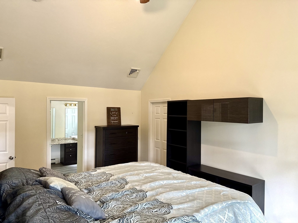 7 Tower Hill Road Oxford, MA 01540 - Photo 32 of 39 a bedroom with a bed and a dresser