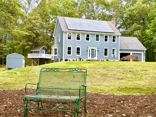 a view of a house with swimming pool