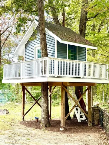 a view of a house with a park