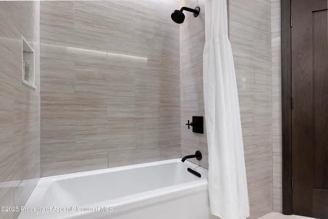 a bathroom with a bathtub