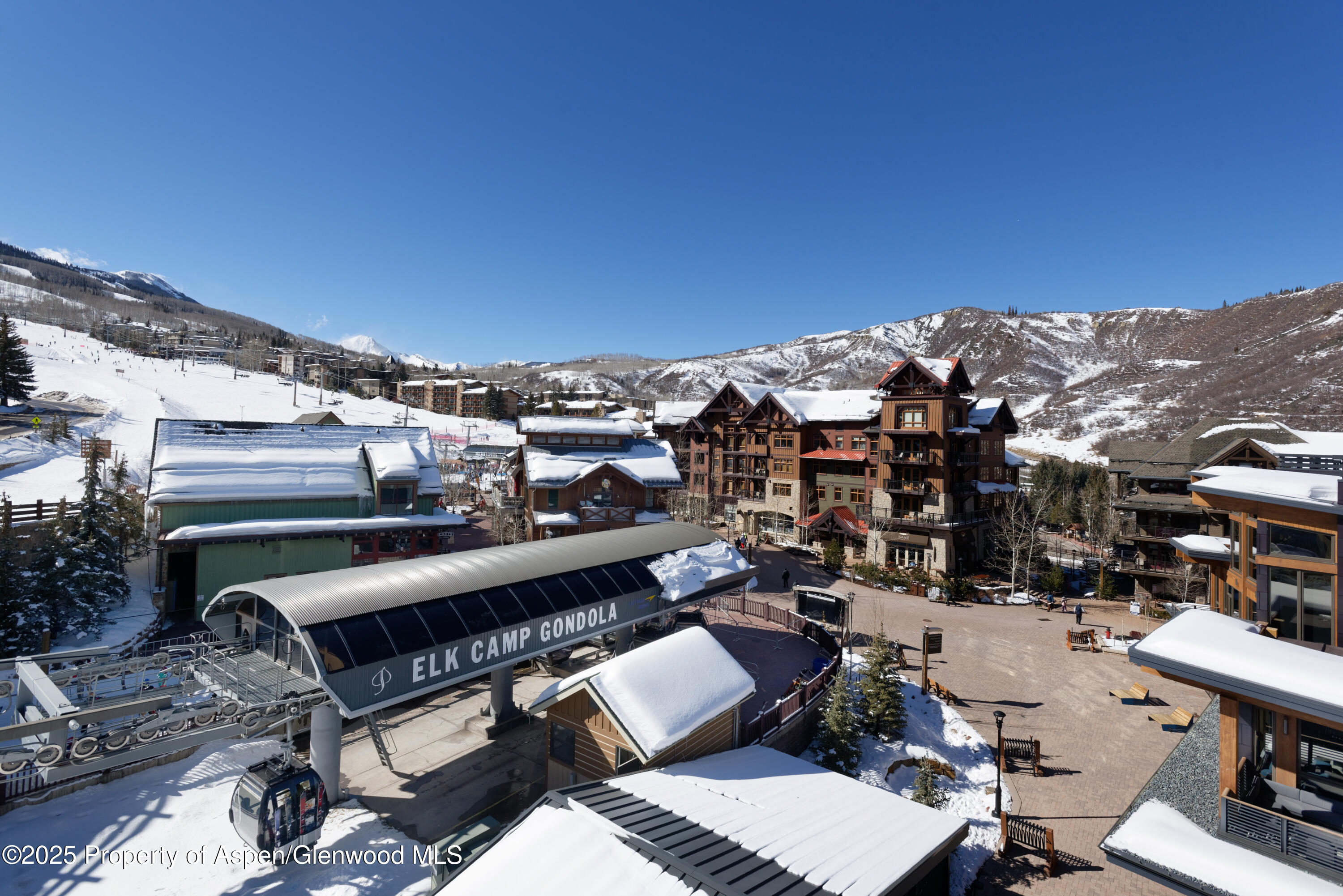 65 Wood Road, Unit 517 Snowmass Village, CO 81615 - Photo 18 of 28 a view of city from terrace with seating space