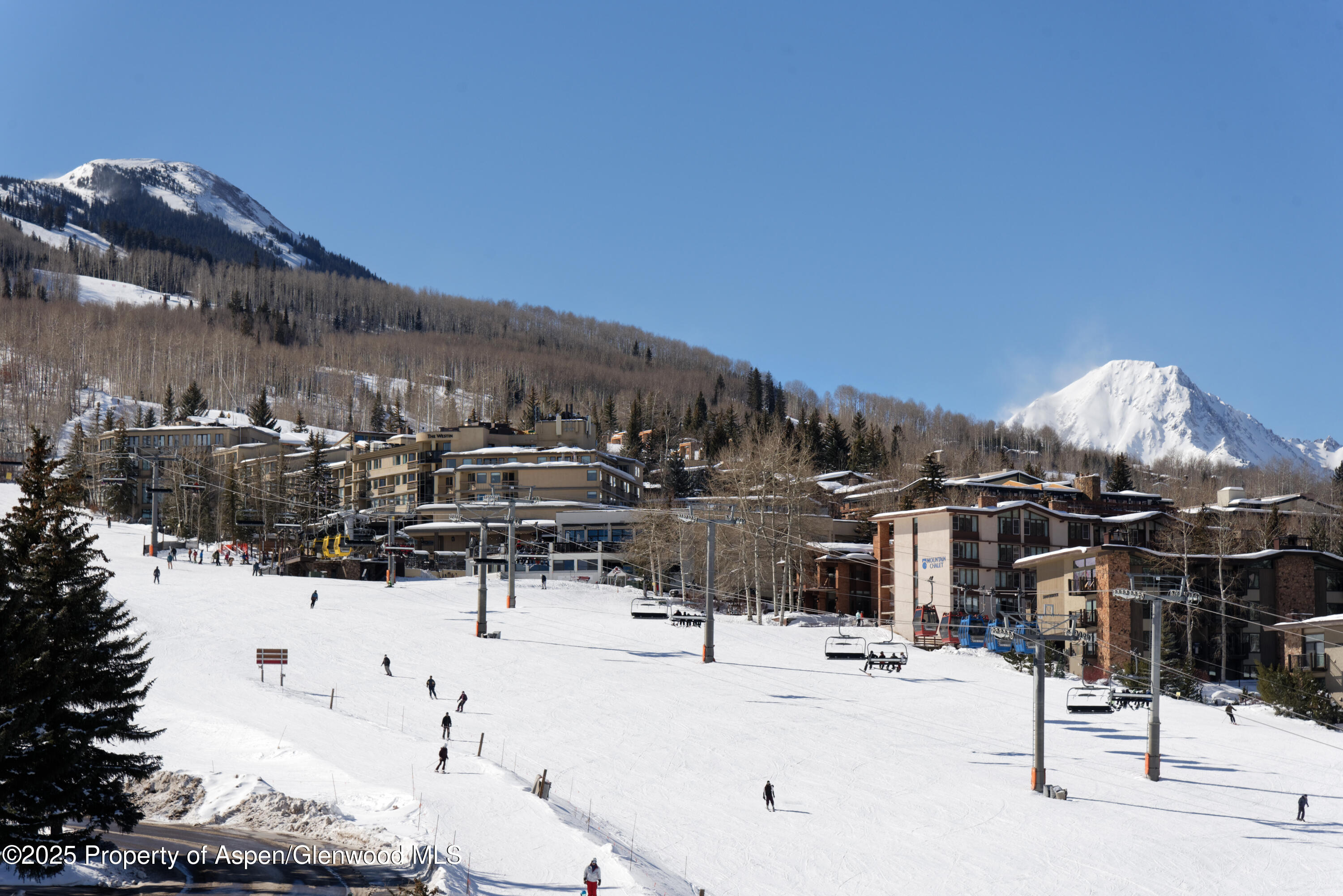 65 Wood Road, Unit 517 Snowmass Village, CO 81615 - Photo 19 of 28 a view of outdoor space with seating area