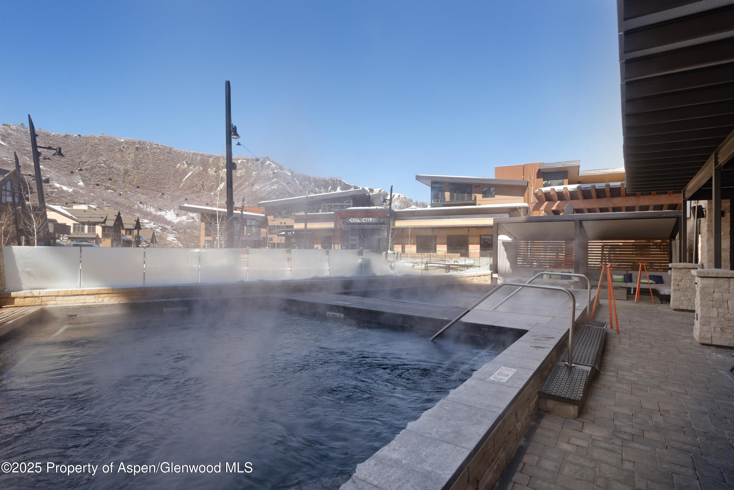 65 Wood Road, Unit 517 Snowmass Village, CO 81615 - Photo 27 of 28 a view of a terrace with wooden floor
