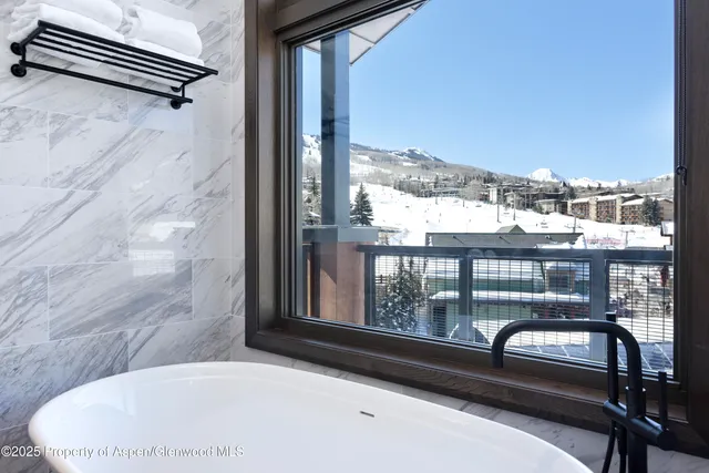 a view of balcony with furniture