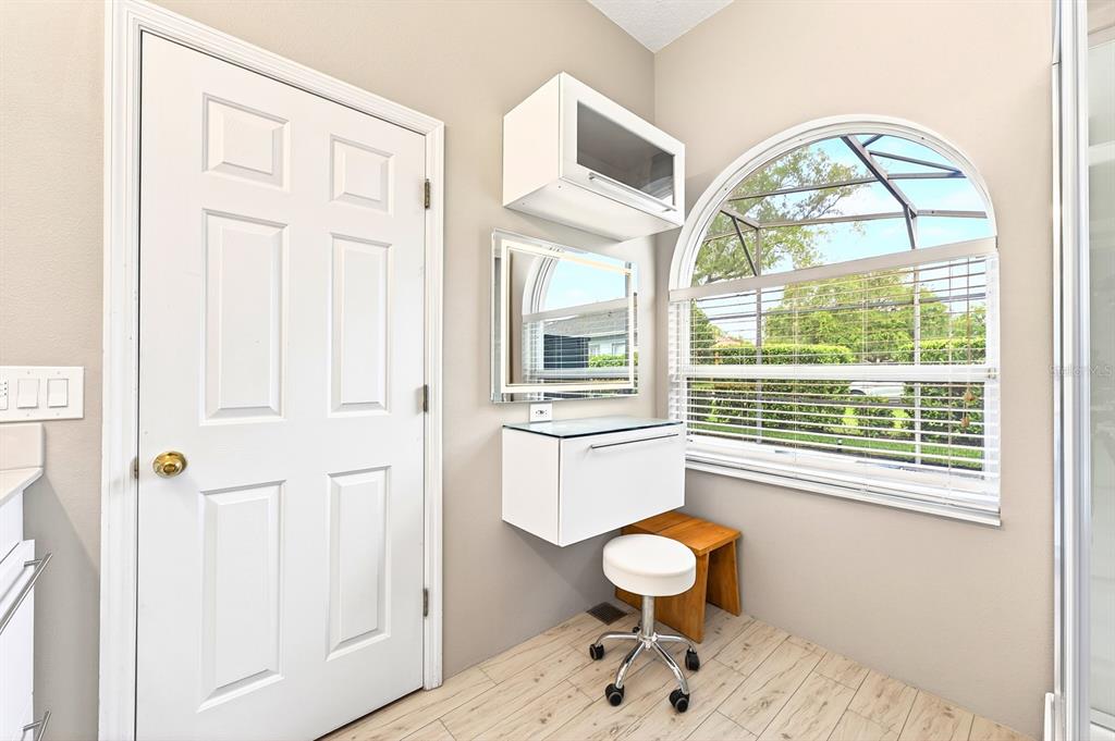 990 Ridgemount Place Lake Mary, FL 32746 - Photo 23 of 46 a view of a livingroom with wooden floor and a bathroom