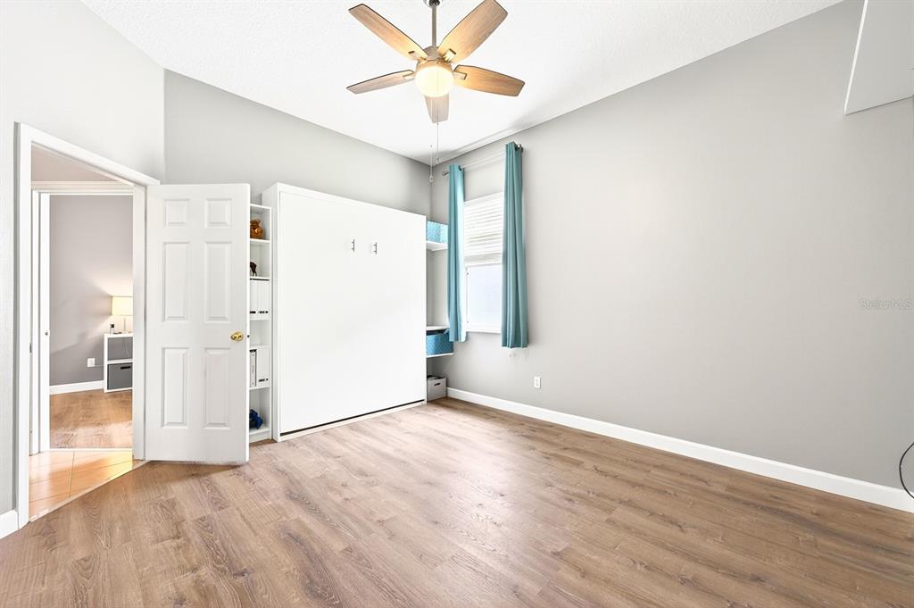 990 Ridgemount Place Lake Mary, FL 32746 - Photo 26 of 46 a view of an empty room with a window