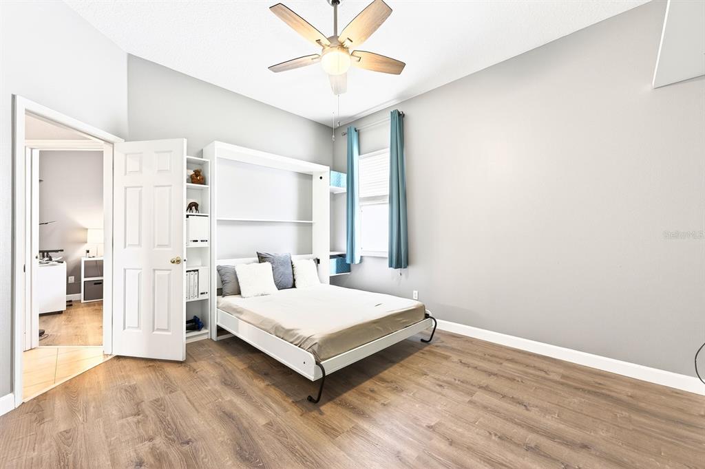 990 Ridgemount Place Lake Mary, FL 32746 - Photo 27 of 46 a room with a bed and window