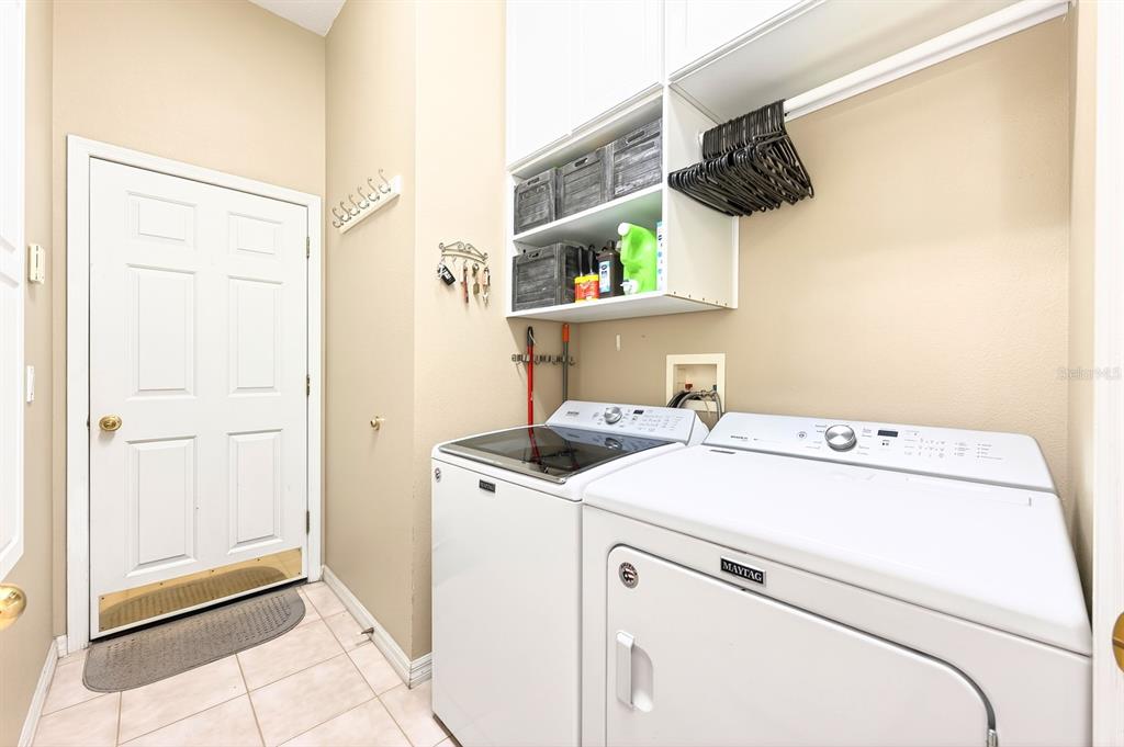 990 Ridgemount Place Lake Mary, FL 32746 - Photo 28 of 46 a utility room with dryer and washer