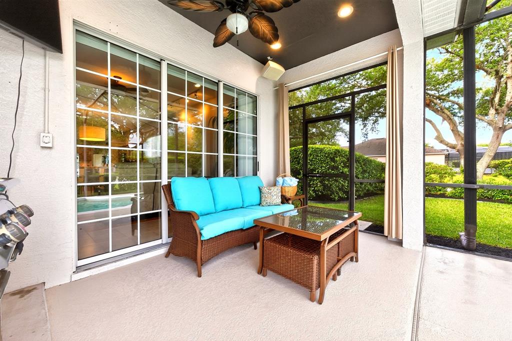 990 Ridgemount Place Lake Mary, FL 32746 - Photo 30 of 46 a outdoor living space with furniture and garden view