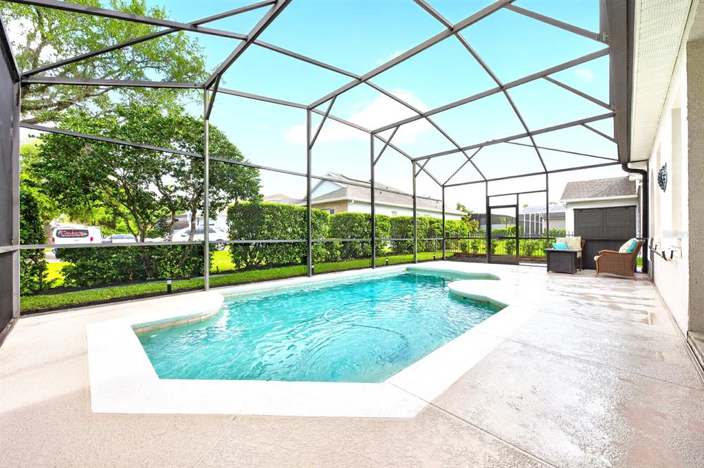 990 Ridgemount Place Lake Mary, FL 32746 - Photo 3 of 46 a view of yard with swimming pool and green space