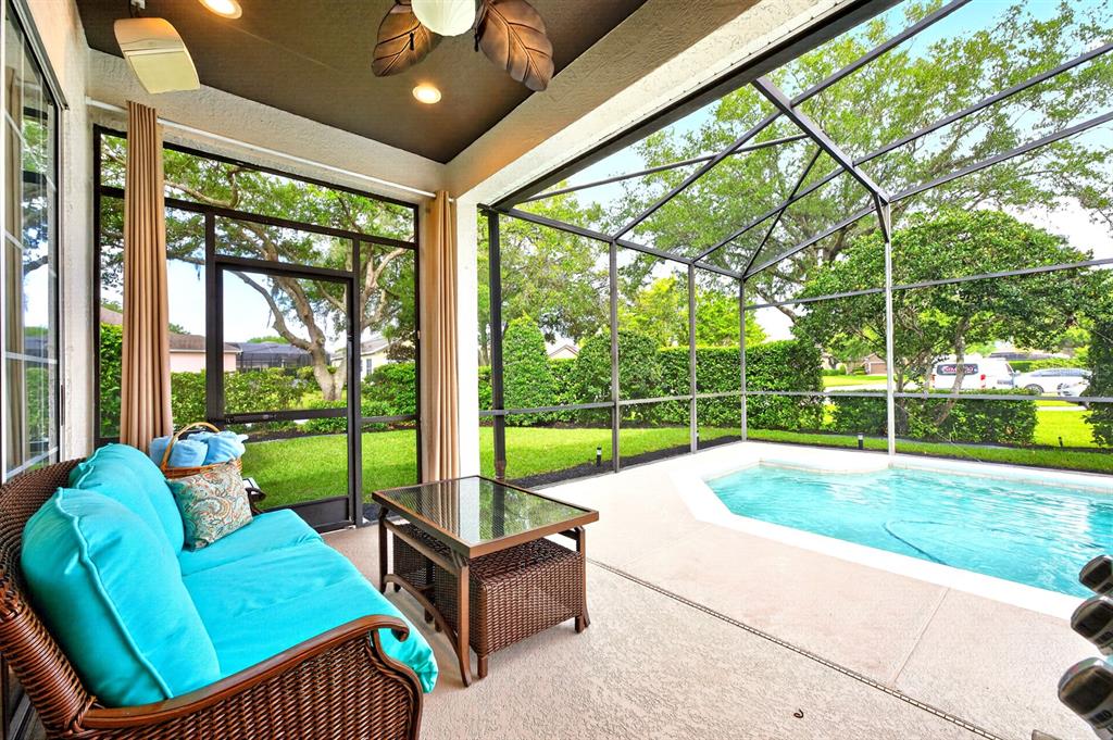 990 Ridgemount Place Lake Mary, FL 32746 - Photo 31 of 46 a living room with yard and furniture