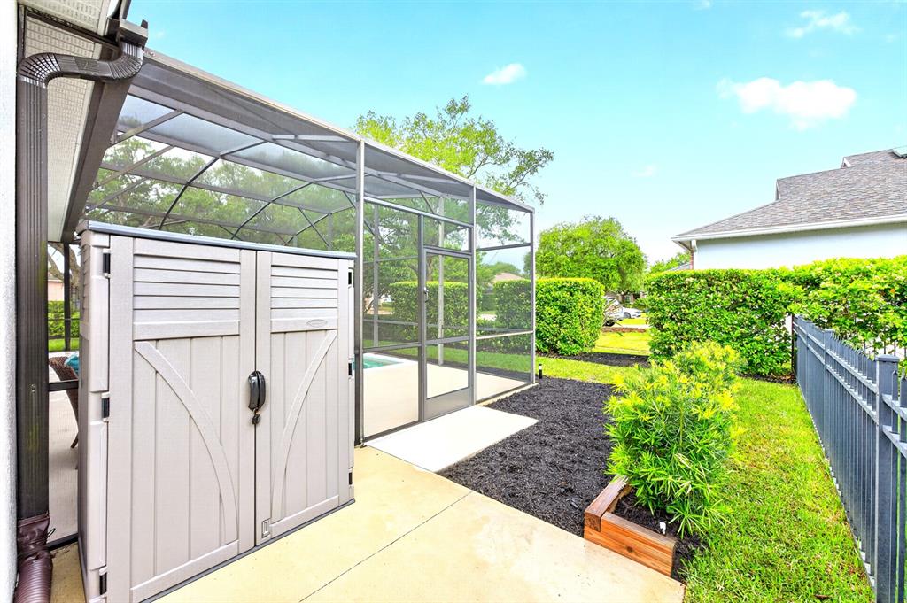 990 Ridgemount Place Lake Mary, FL 32746 - Photo 34 of 46 a view of a backyard with garden