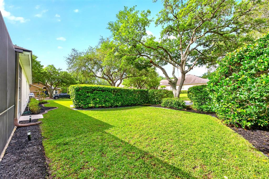 990 Ridgemount Place Lake Mary, FL 32746 - Photo 35 of 46 a view of a back yard of the house