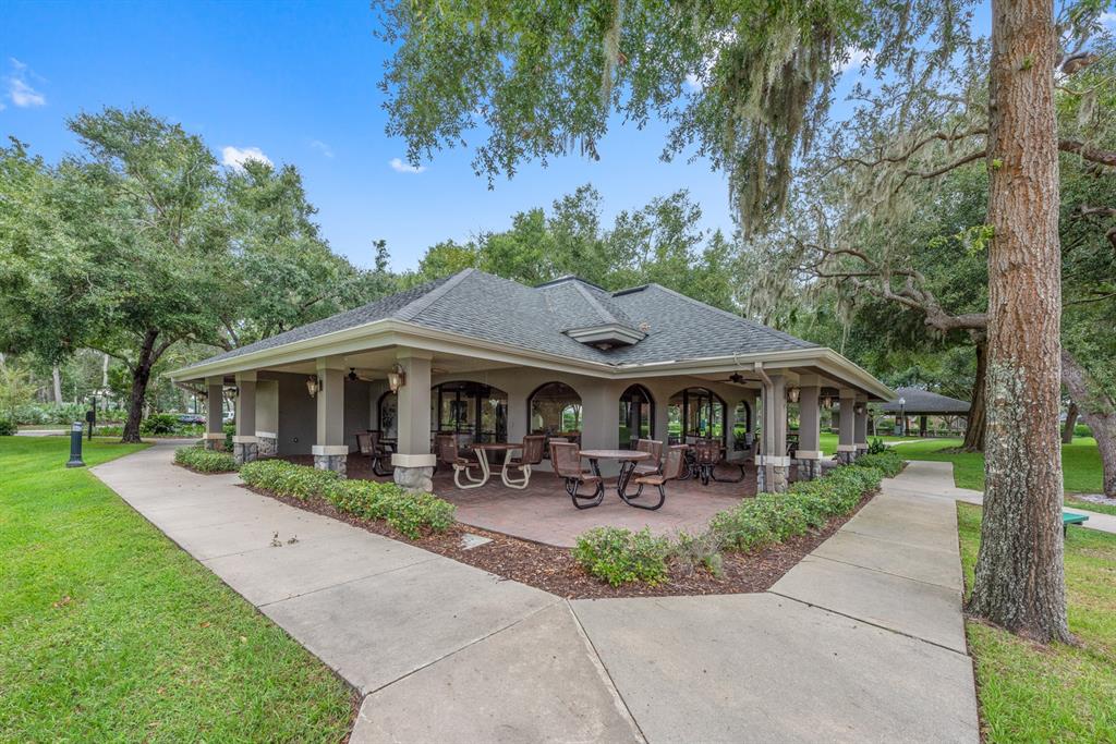 990 Ridgemount Place Lake Mary, FL 32746 - Photo 41 of 46 a front view of a house with garden