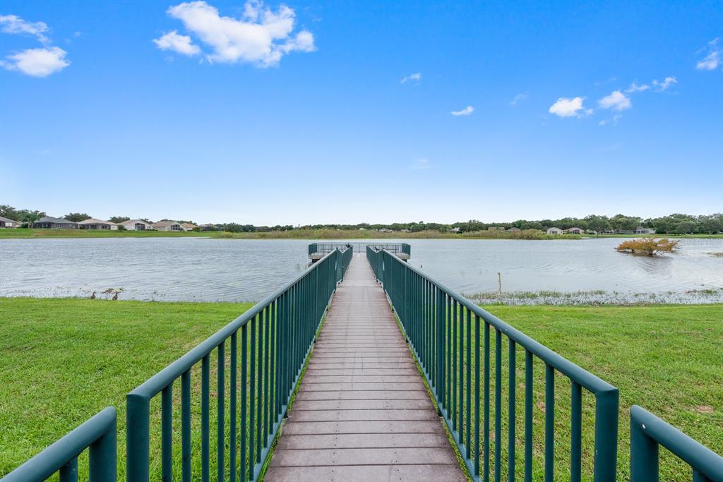 990 Ridgemount Place Lake Mary, FL 32746 - Photo 42 of 46 a view of outside space and a lake view
