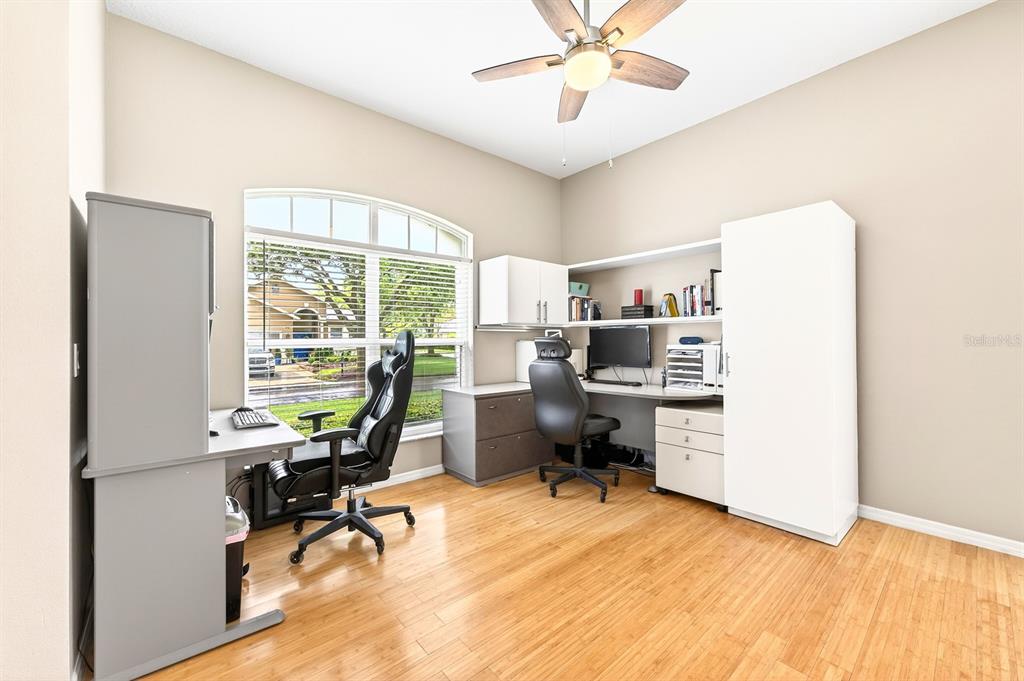 990 Ridgemount Place Lake Mary, FL 32746 - Photo 45 of 46 a workspace with chandelier