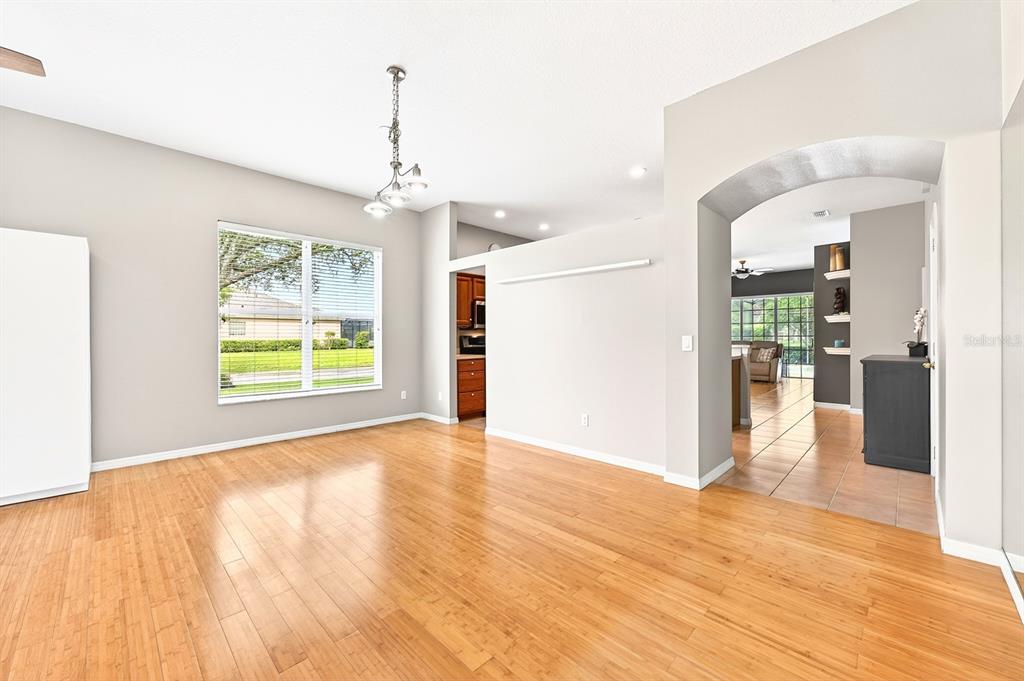 990 Ridgemount Place Lake Mary, FL 32746 - Photo 46 of 46 a view of livingroom with hardwood floor and a ceiling fan