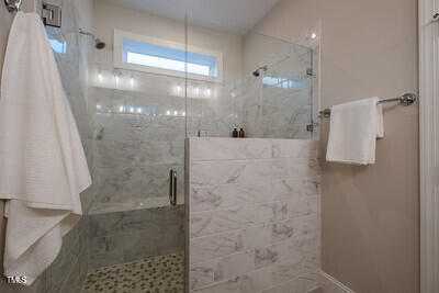 167 Logbridge Road Chapel Hill, NC 27516 - Photo 22 of 45 The spa-like shower is wonderful.