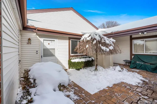 a view of a house with a patio