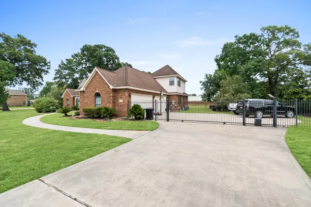 a view of house with outdoor space and street view