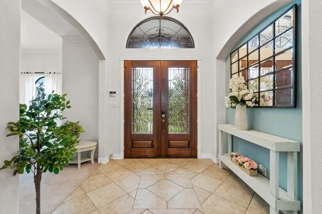 an entryway with a flower garden